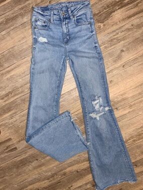 American Eagle Outfitters Distressed High-Rise Flare Jeans - Light Blue